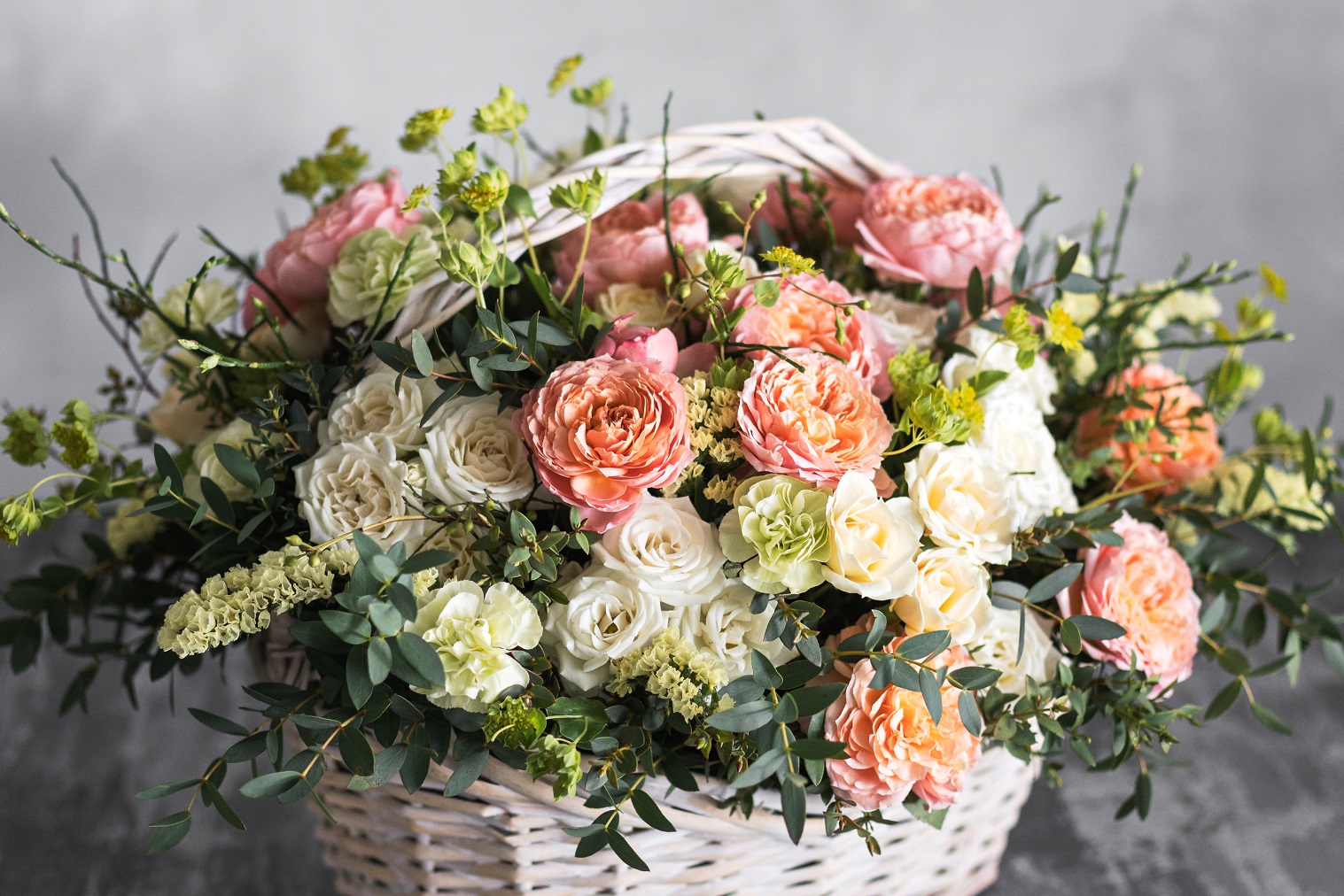 Beautiful Flower Composition A Bouquet In A Wicker Basket. Floristry Concept. Spring Colors